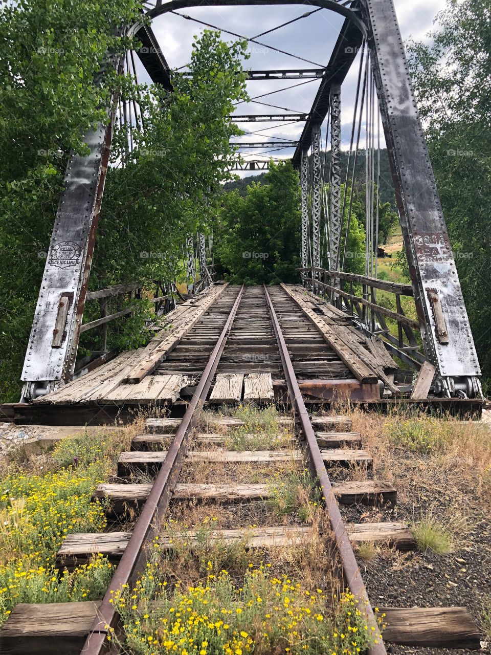 Old abandoned railroad tracks and bridge