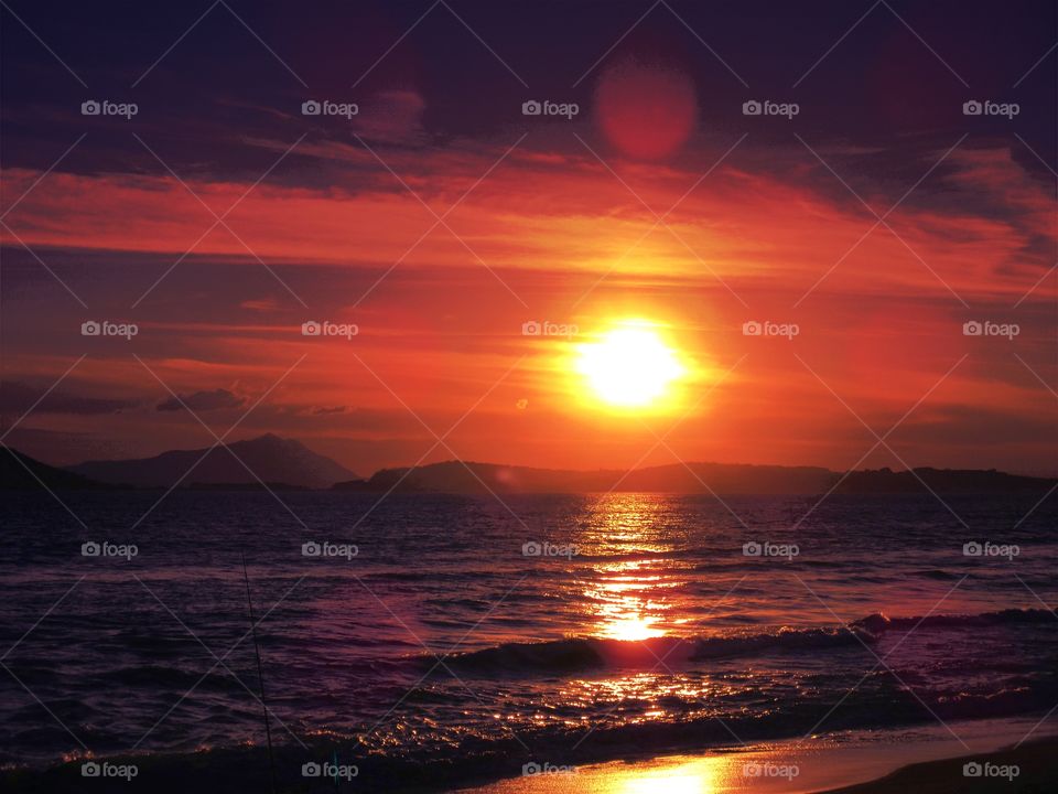 Sunset over Bacoli seen from Bagnoli  (Naples ).