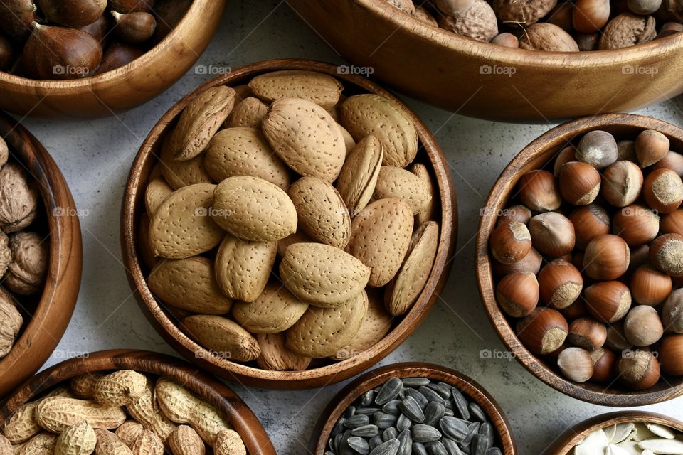 Nuts and seeds in a wooden bowls 