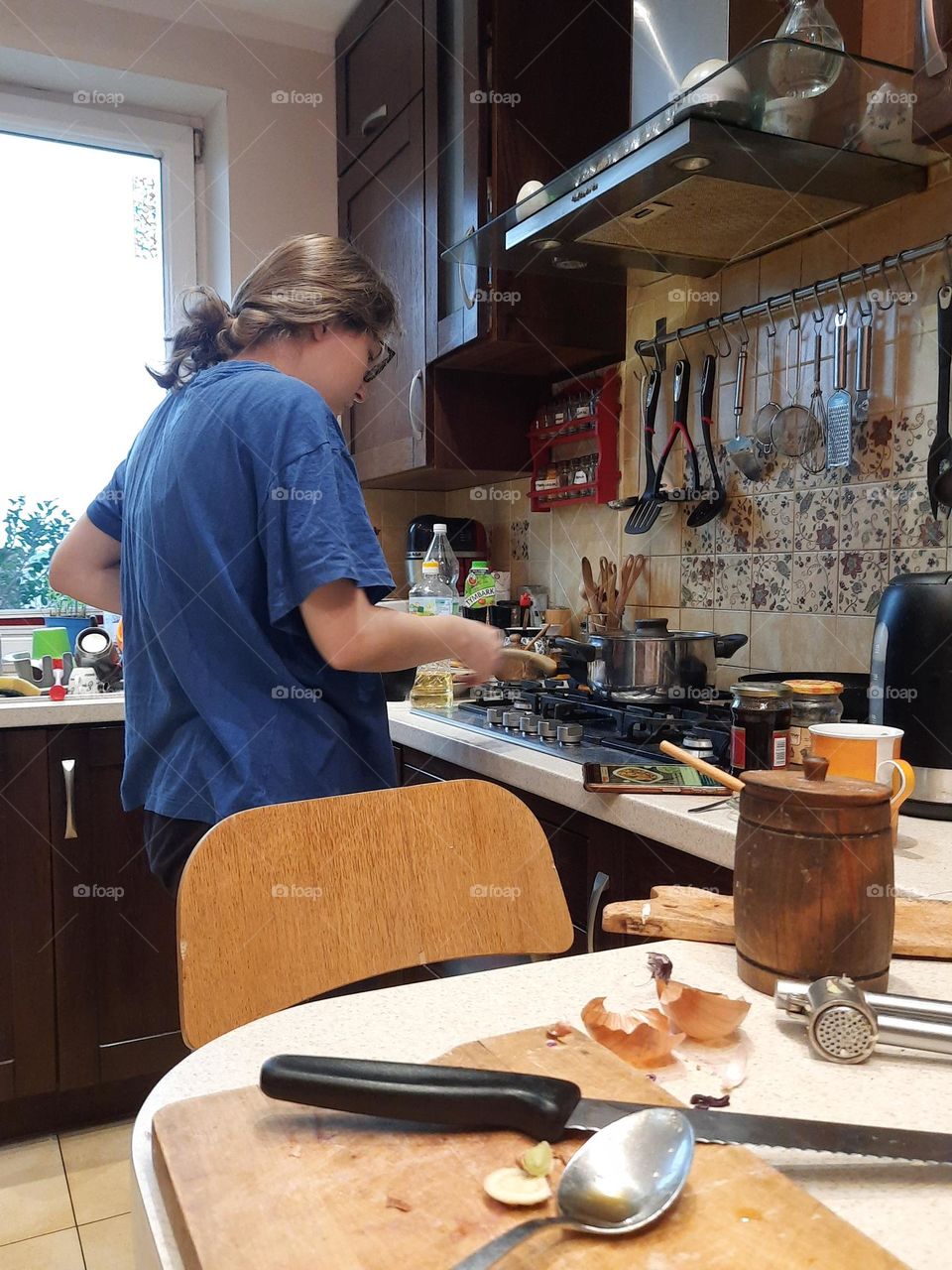 adolescent girl in the kitchen