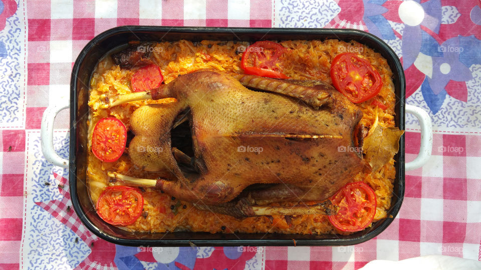 Lunch. Goose on cabbage