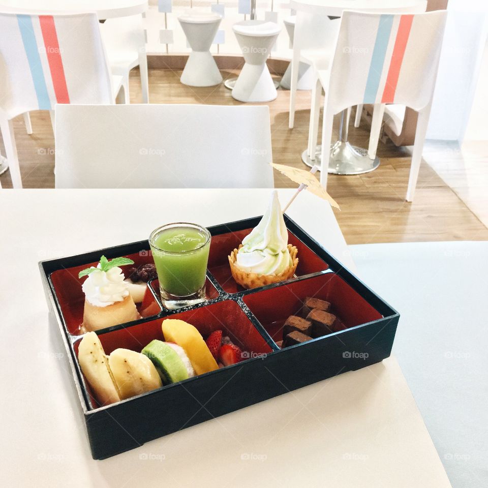 Summertime Ice Cream : Soft ice cream with fresh fruit and chocolate serving on bento Japanese style 