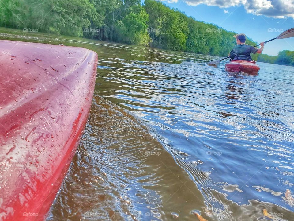 2 kayaks on river