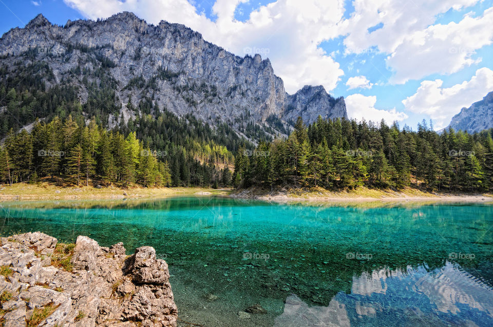 Hiking around the green lake at styria, austria