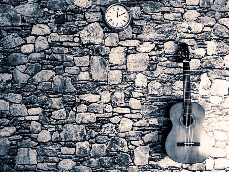 bricks wall and guitar