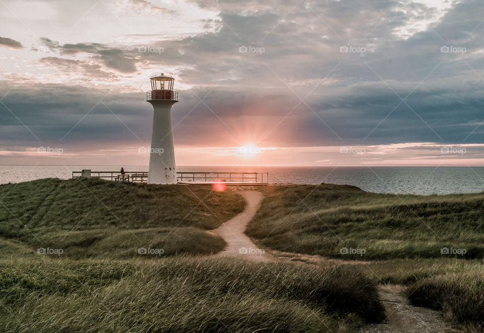 Lighthouse by the sunset