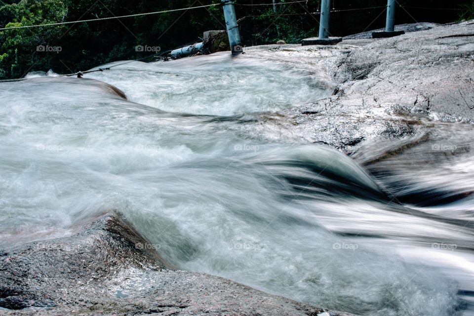 Water gushing in a stream in the mountain
