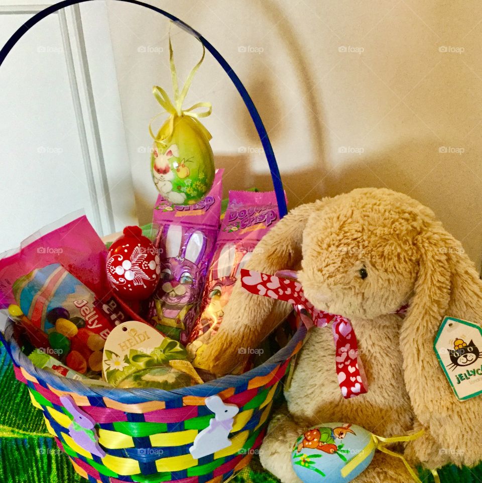 Easter basket with chocolate and bunny 