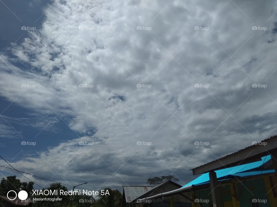 white clouds clearly visible in the blue sky

￼