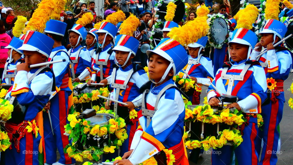 Children celebrating carnival on street