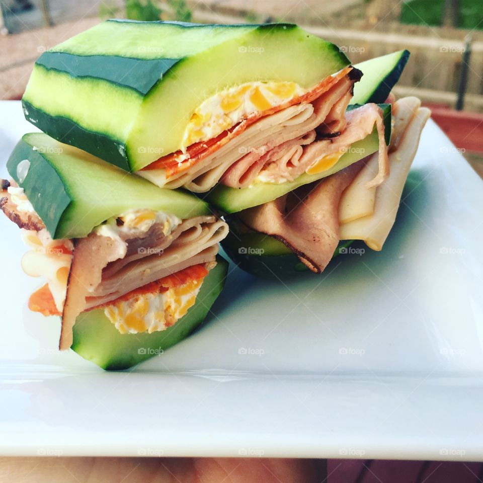 No bun?! That’s right! A fun spin on a sandwich. Cucumber bun filled with all your favorites!
