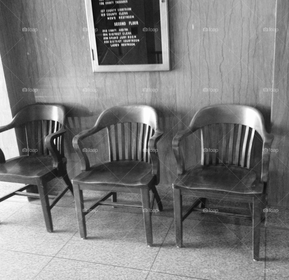 Vintage chairs in the court ho. Vintage wooden chairs in the Gillespie County courthouse in Fredericksburg, Texas.