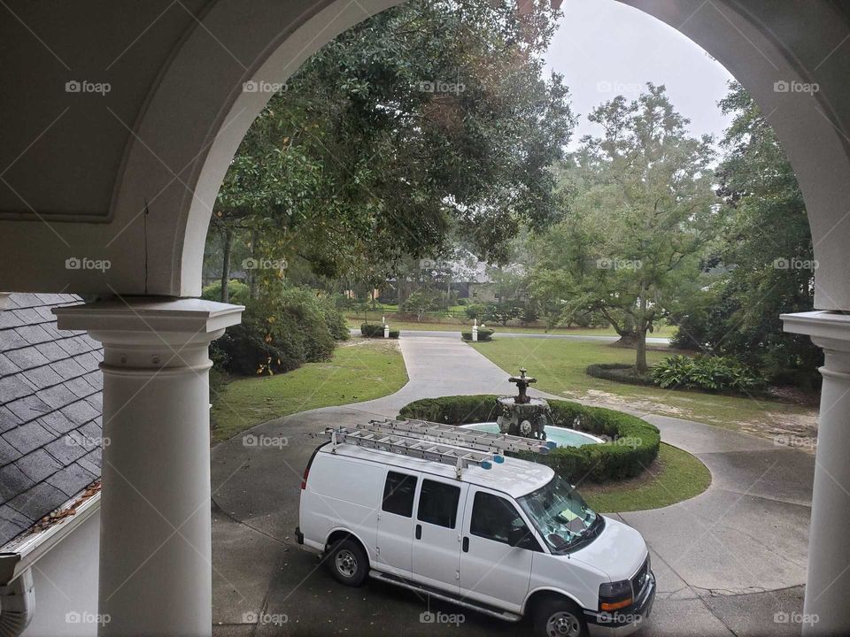construction can at a home in the driveway