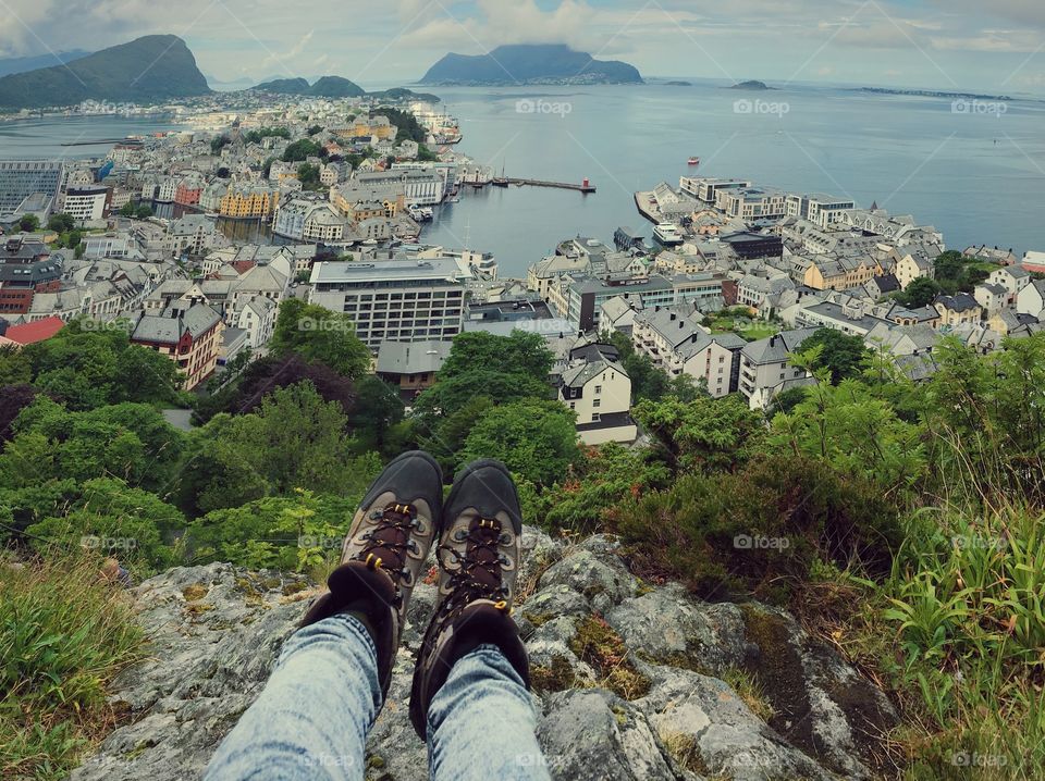 Feet view above the city  