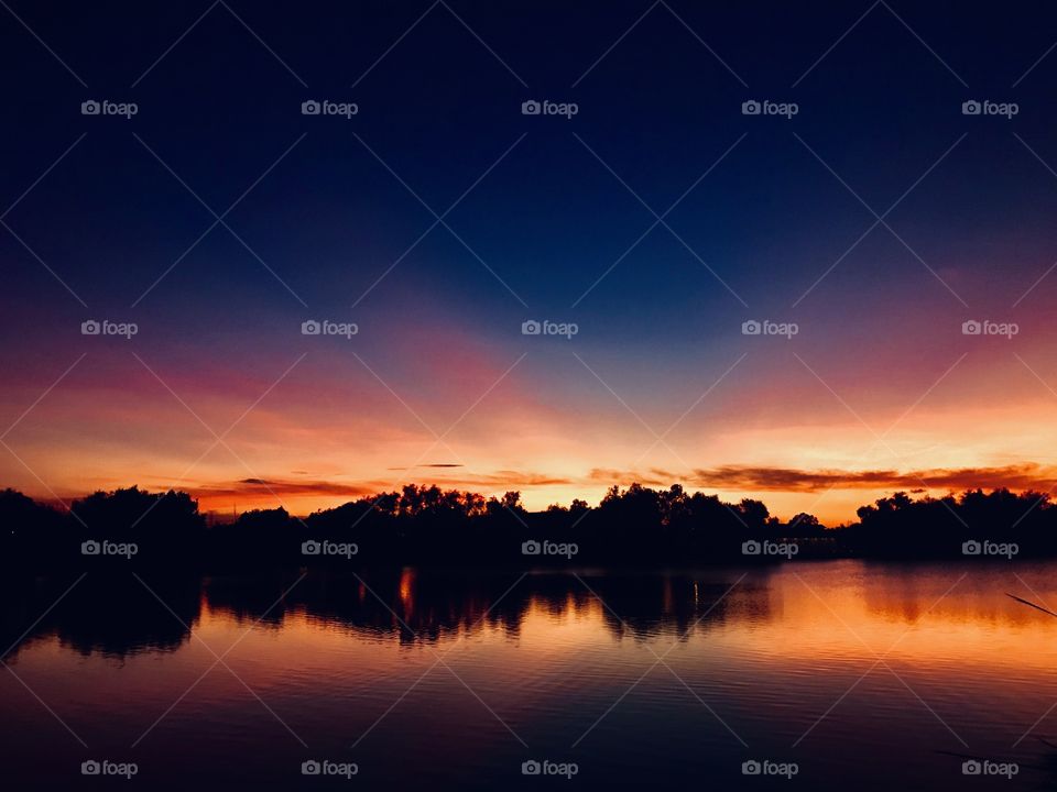 Yes this a Totally Gorgeous beginning of an eventful Evening of color. The Sun is 5 minutes from set. Looking beyond the set may have line of Rising Rays which will brighten the set up for night. The Rays will disappear quickly because night is now. 