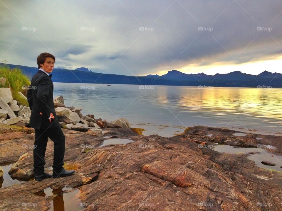 Lena Hope. Boy enjoying the sunset