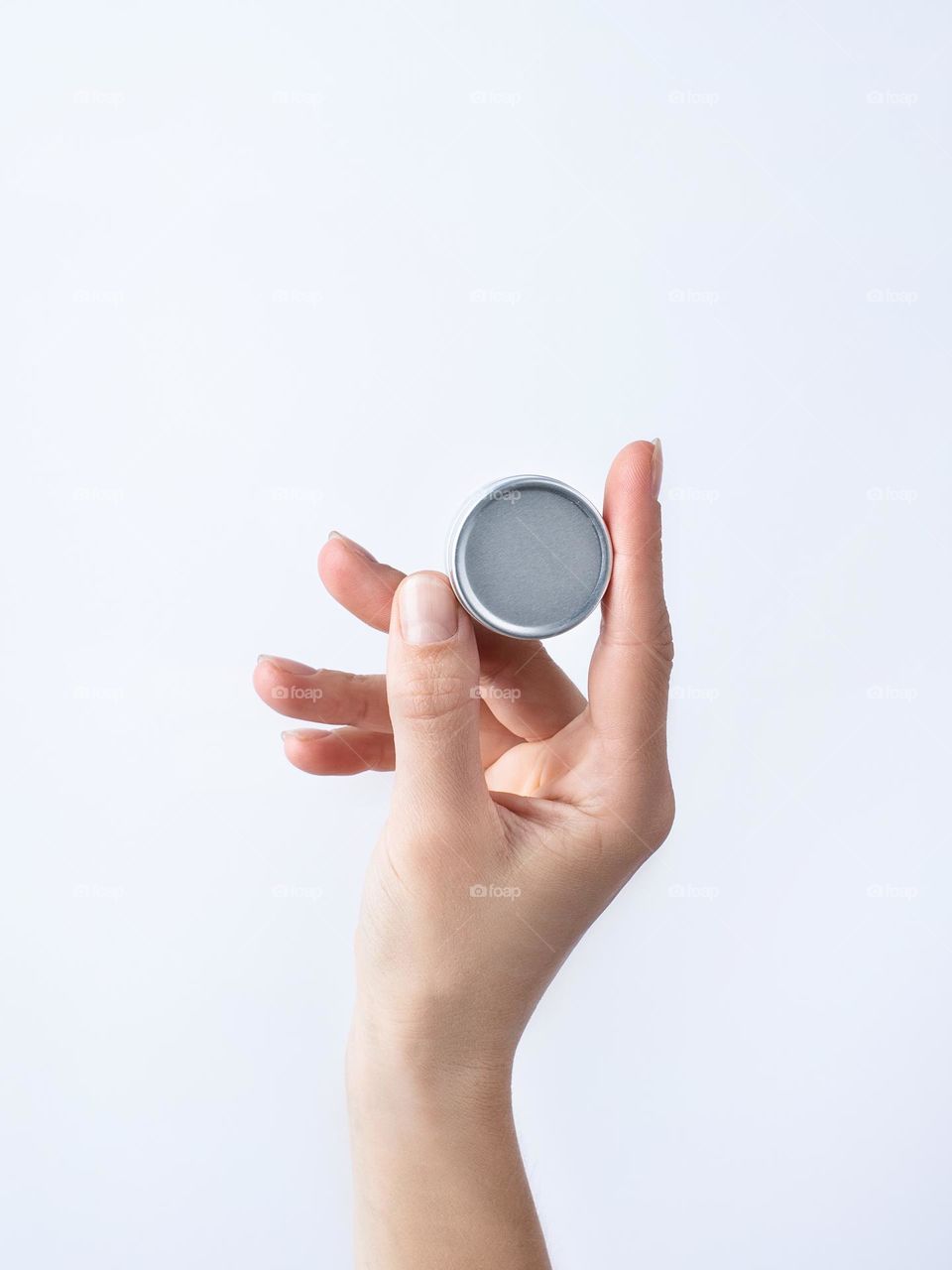 woman hands holding beauty products