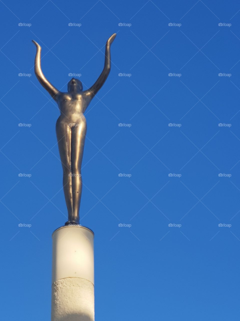 The sculpture of a lady reaching towards the heavens. Our town of Napier with it's beautiful sights along the coast of Hawkes Bay.
