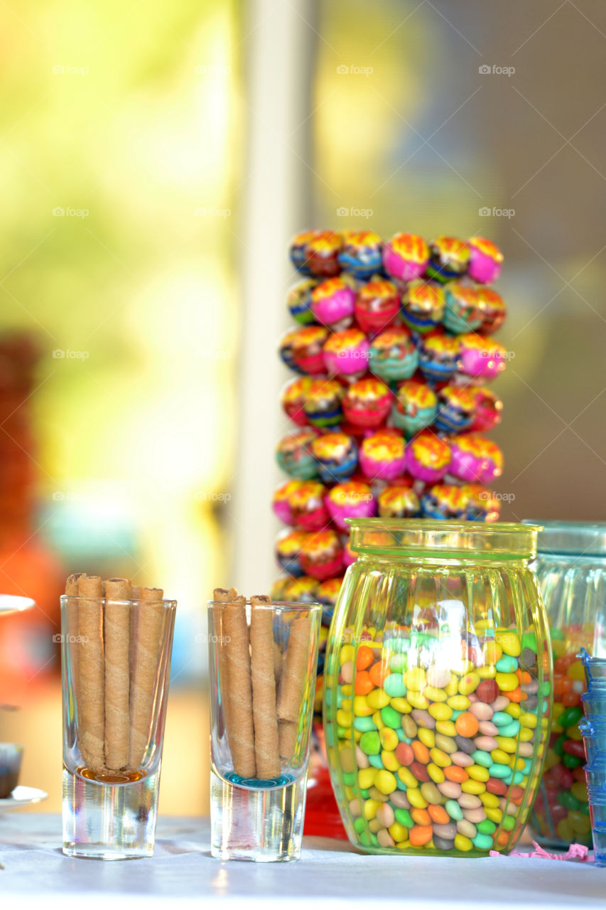 colorful sweets in a jar on a candy table