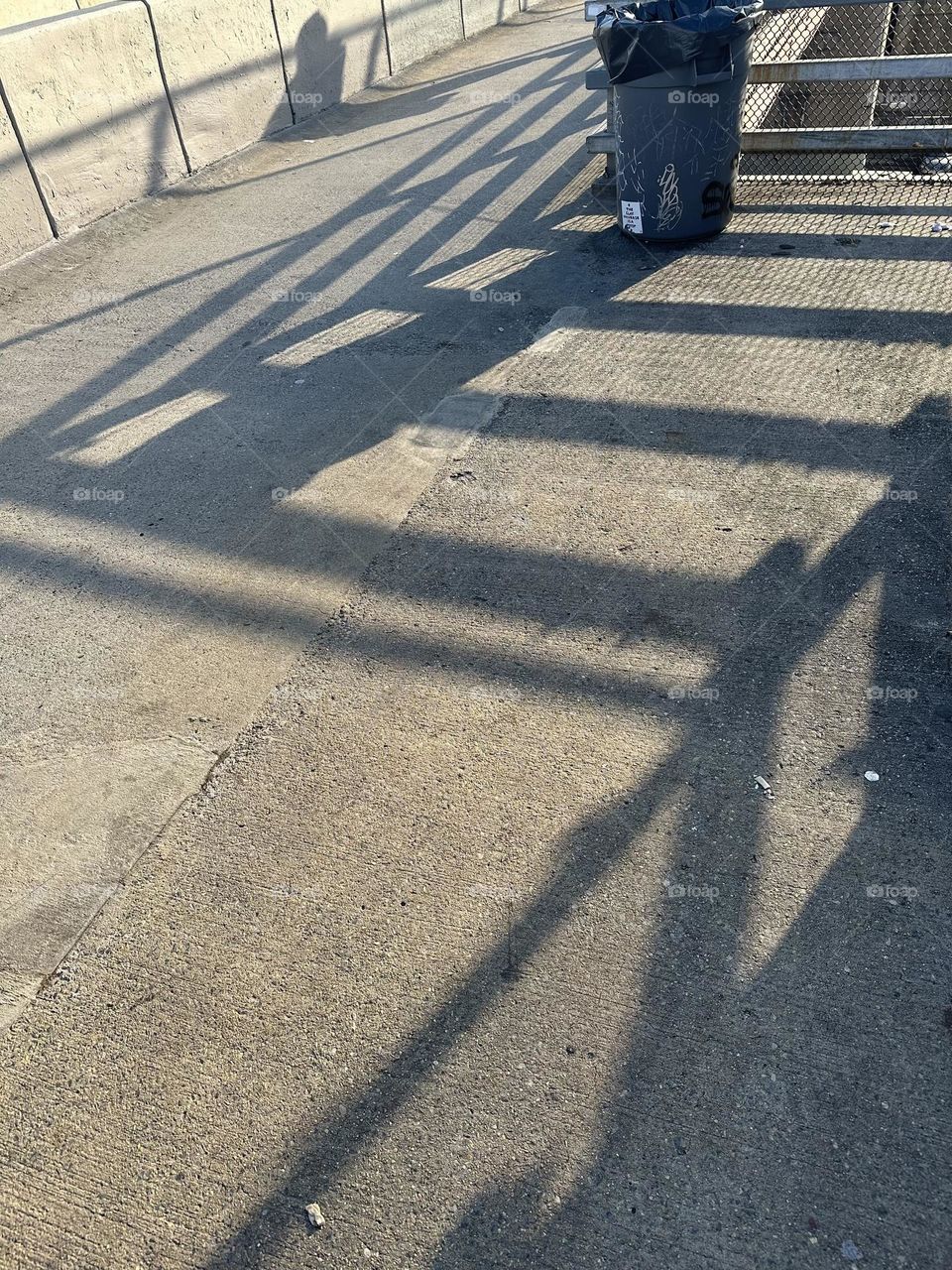 The “Pulaski Bridge” at “Newtown Creek” in LIC, Queens has many interesting design patterns underlying its construction which also cast intricate shadows that change with the time of day and the position of the sun. 2023. Hypnotic Productions