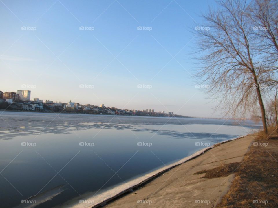 spring is coming, the ice is melting on the river, the sun is warming, nature is awakening from sleep, the city of Voronezh on the river