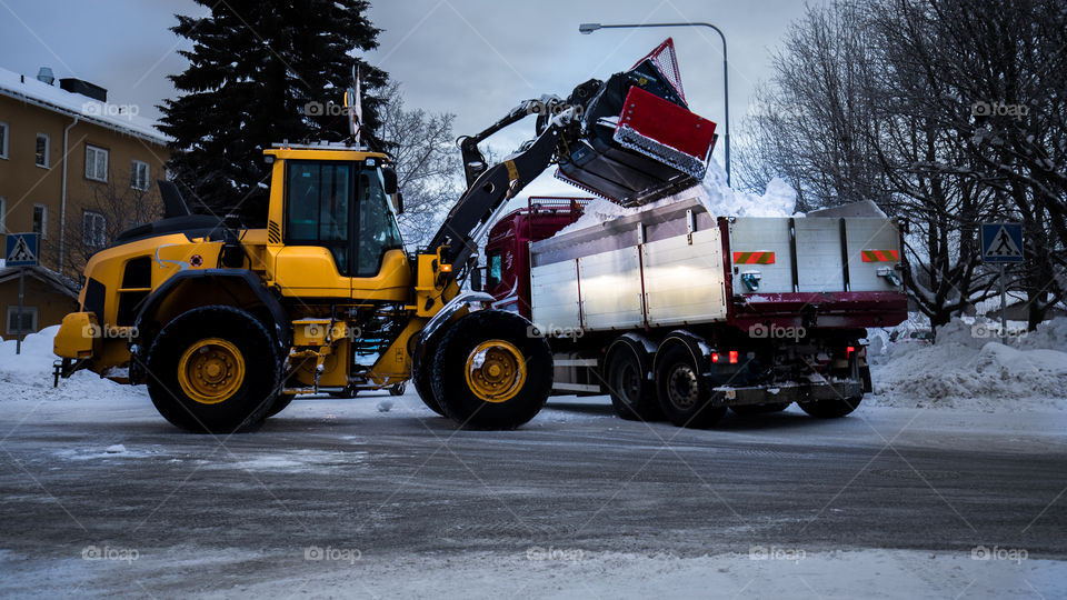 Tractor removes snow from streets