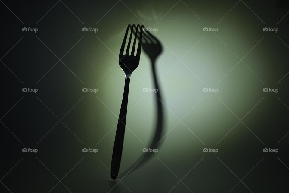 Shadow play with fork