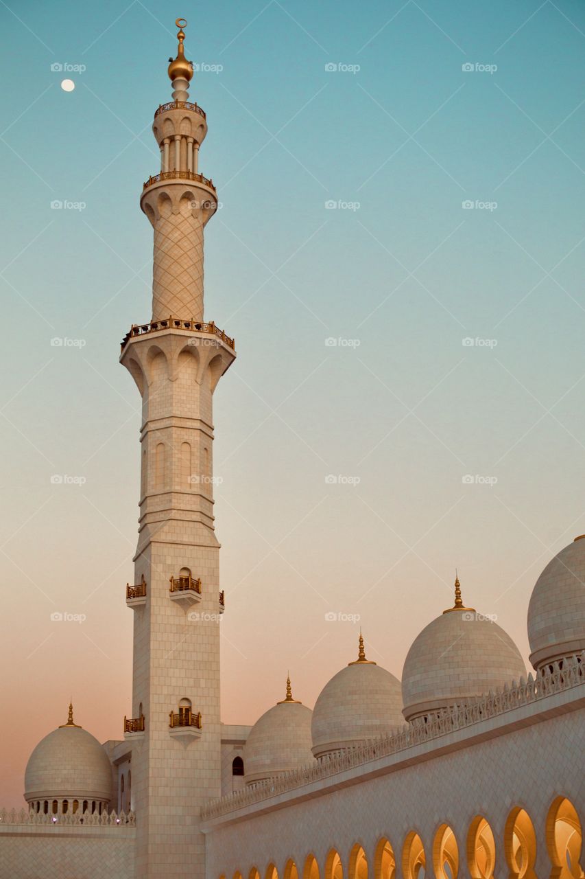 Mosque dome in blue and orange sunset light 