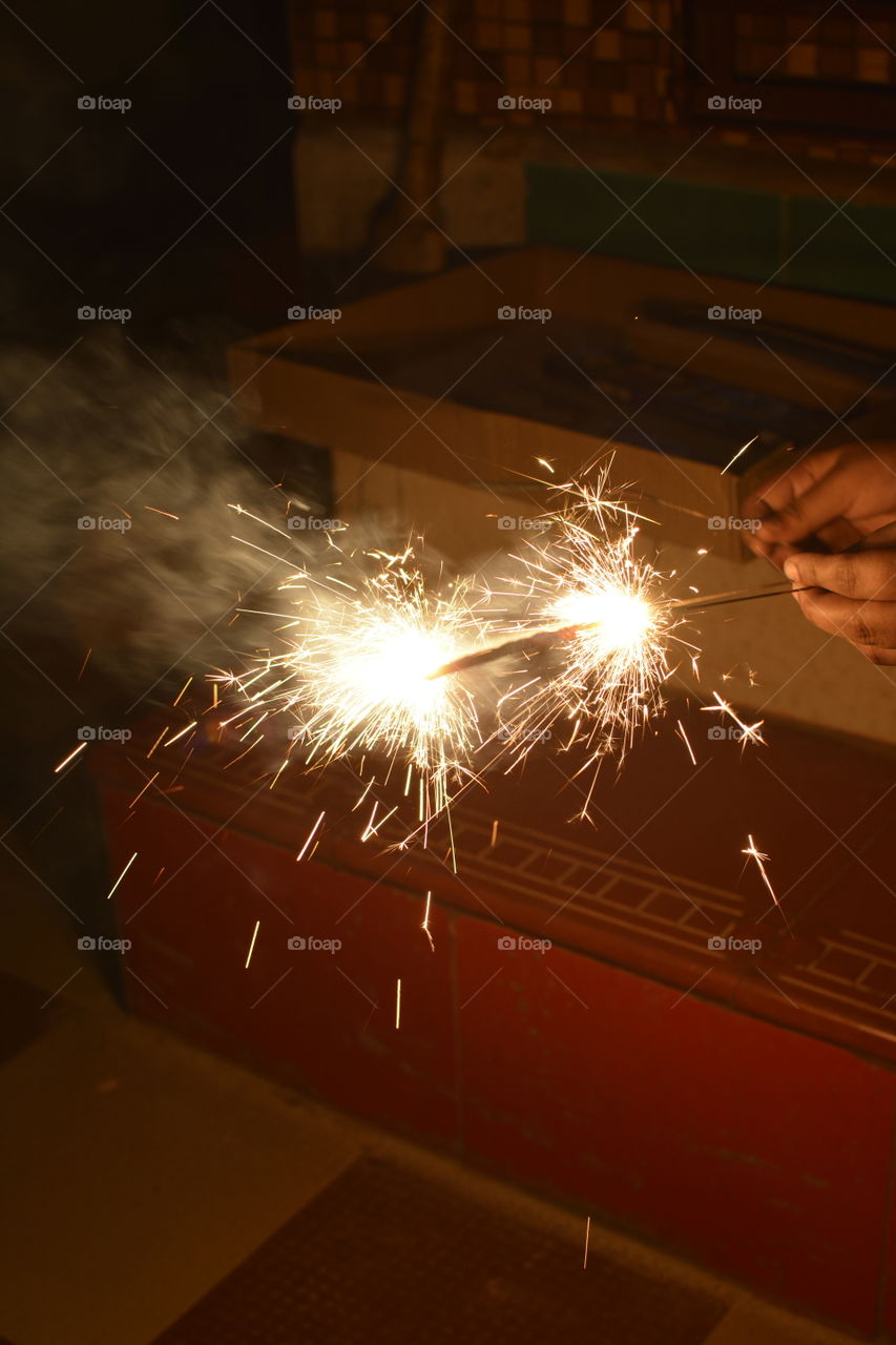 Sparking Fireworks on hands