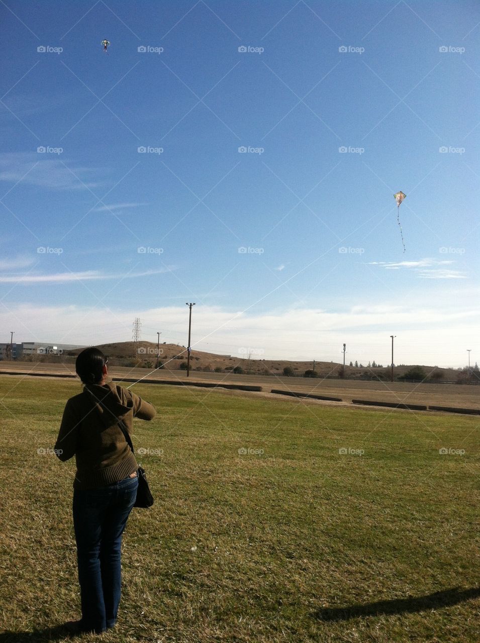 Lady flying kite