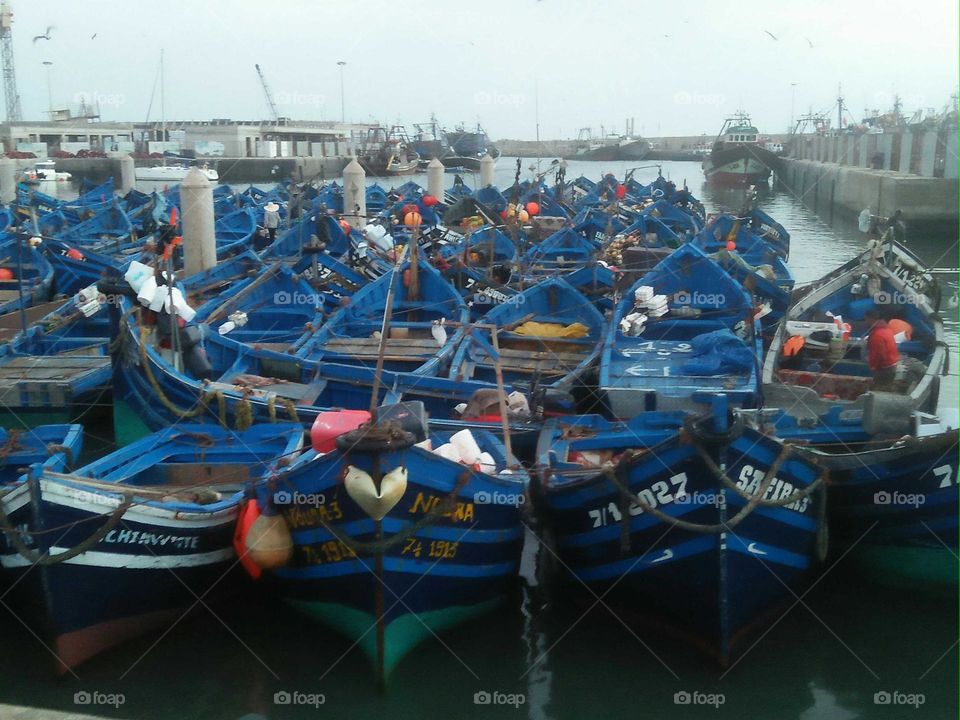 Beautiful blue boats in harbour at essaouira city in Morocco.