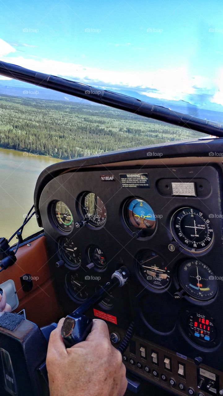 Landing a float plane on a remote lake deep into the wilderness of 
Alaska