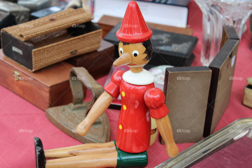 sitting pinoquio. flea market in Lisbon