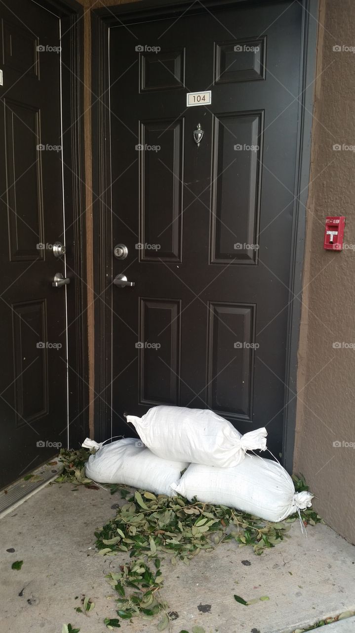 sandbags, doors, leaves, hurricane Irma, Kissimmee, FL