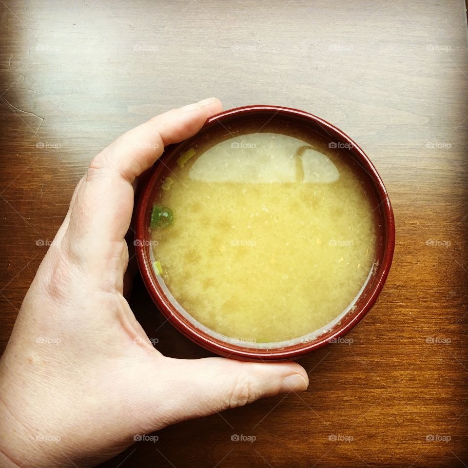 Miso soup in a handmade pottery dish. 