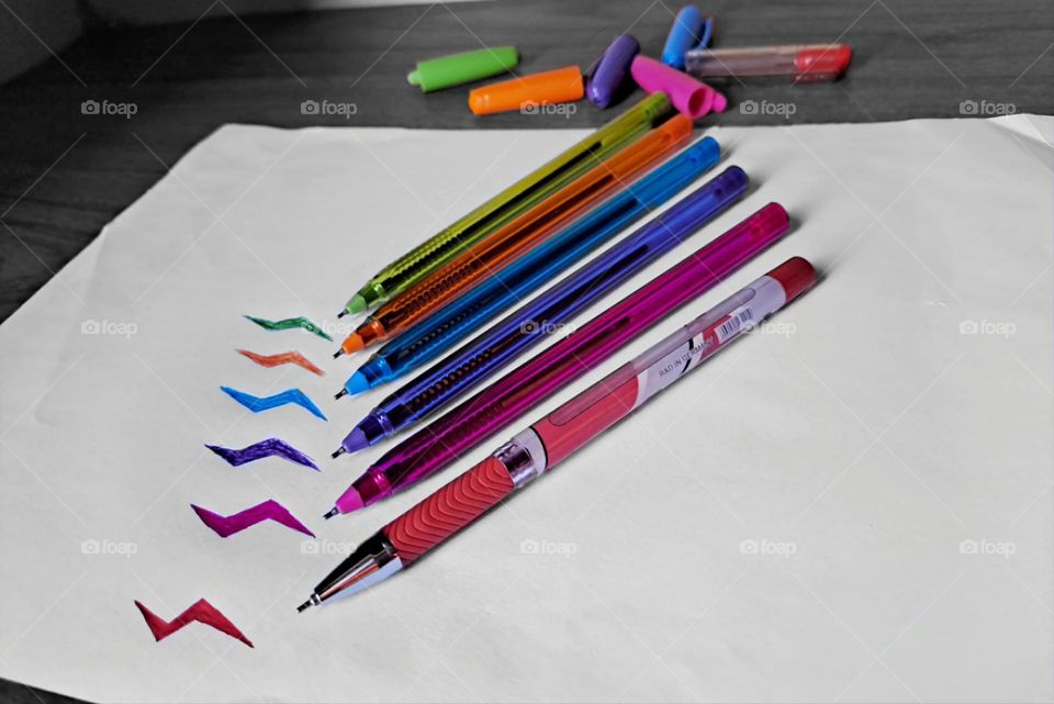 Coloured Pens: Black and White background