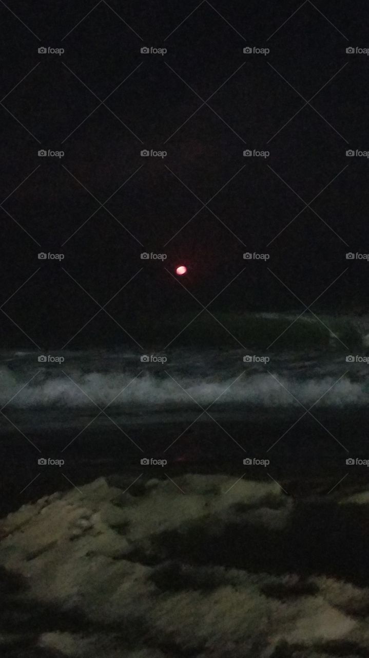 blood moon in the distance