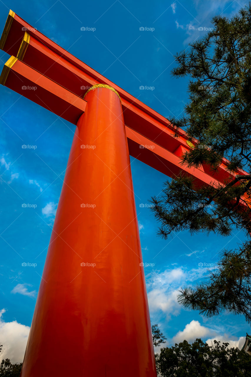 The giant Torii Gate of Heian Shrine (Heian-Jingu), Kyoto, Japan. This huge gate stands high on Jingu-Michi Road and is one of the largest in Japan.