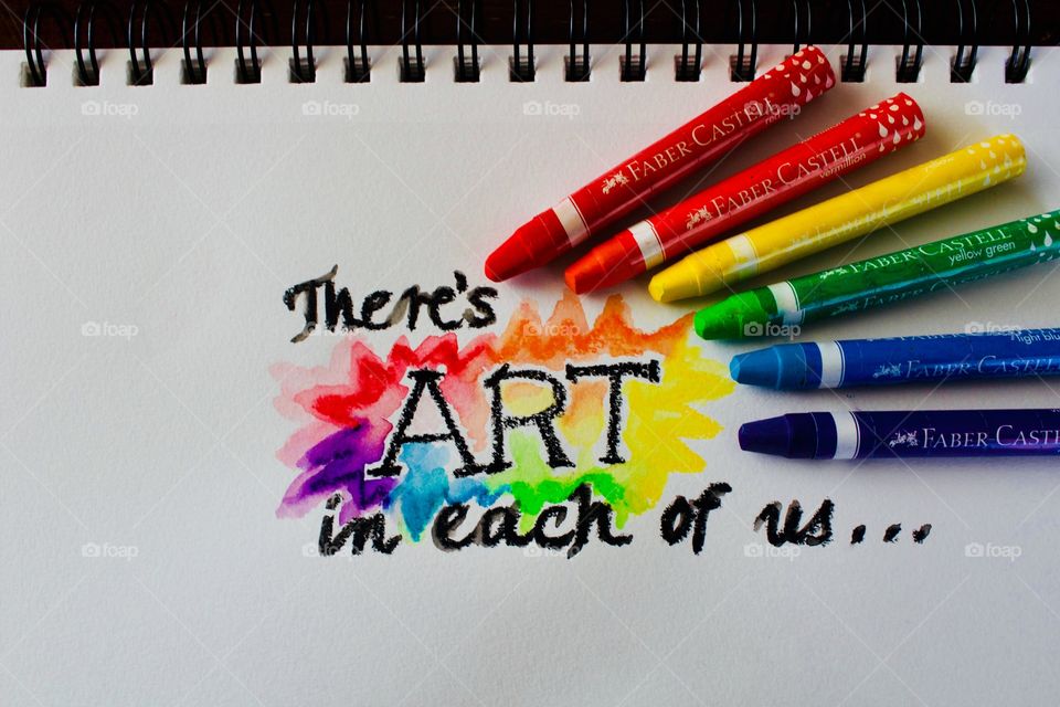 Colours of the World - watercolor crayons on mixed-media wire-bound paper next to watercolor-crayon-embellished phrase “There’s art in each of us...”