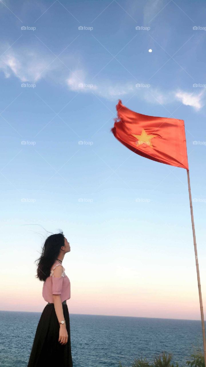 Vietnam's Flag fly in Vietnam Sky
