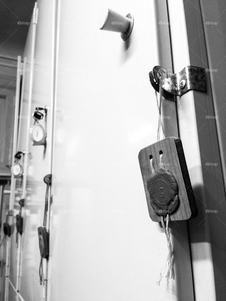 Sealed metal shelfs in the vault with stamp in B/W (black and white) colors