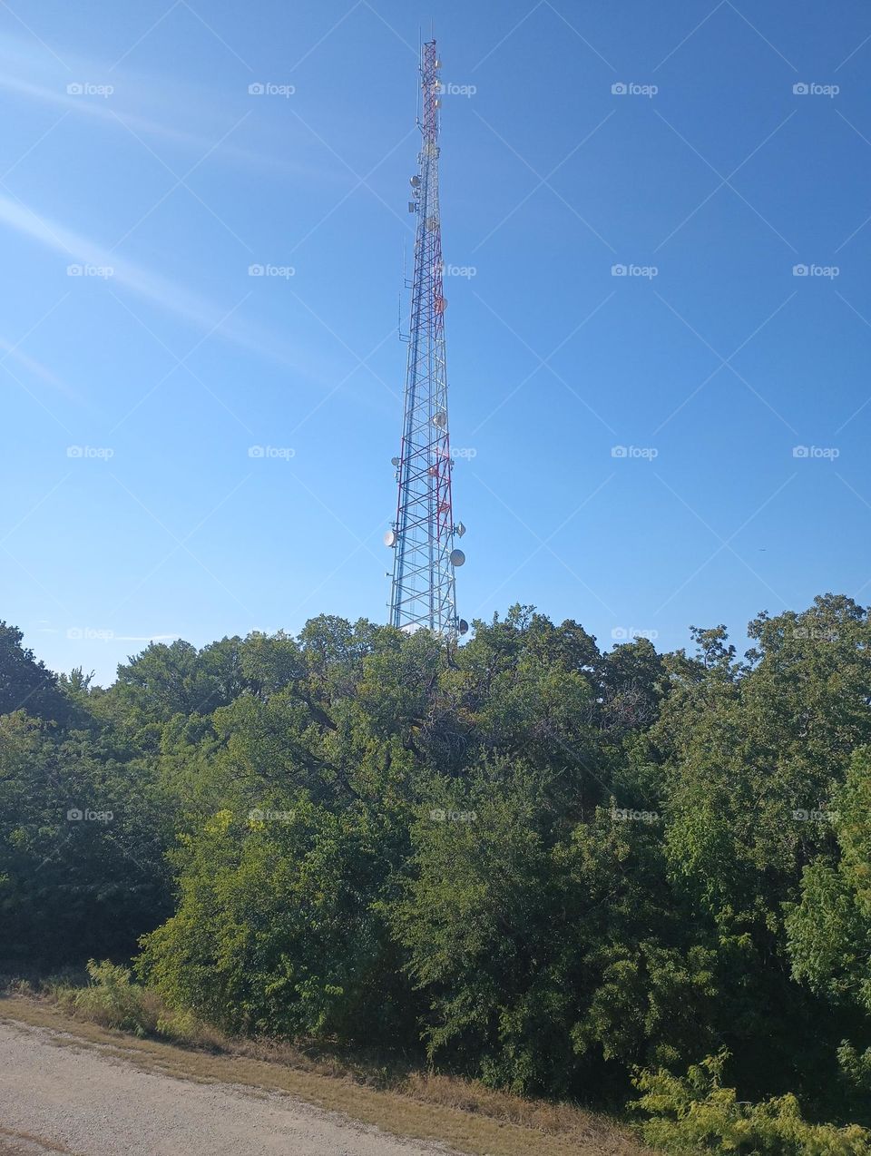 electric tower from interesting view/angle, beautiful hot summer day in July in Texas