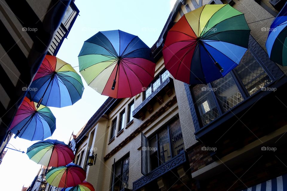 Colourful umbrellas can be seen in the shopping arcade called London Court, Perth, Western Australia.