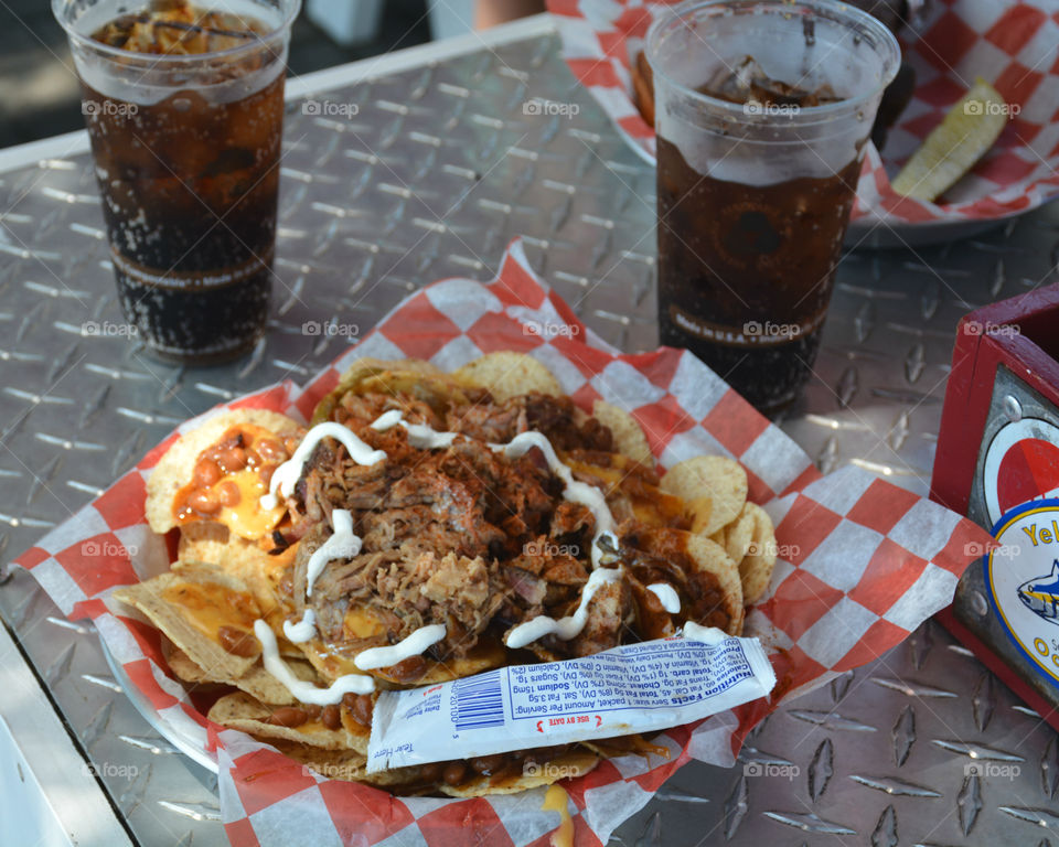 Street Food is ready to eat food or drink sold by a vendor or hawker, in street or other public place, such as a market or fair. I often buy Street Food from a portable food booth, food cart or a food truck! Yummy, yum!