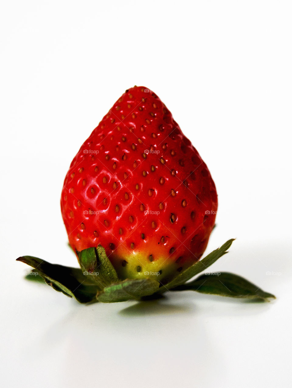 Close-up of strawberry against white background