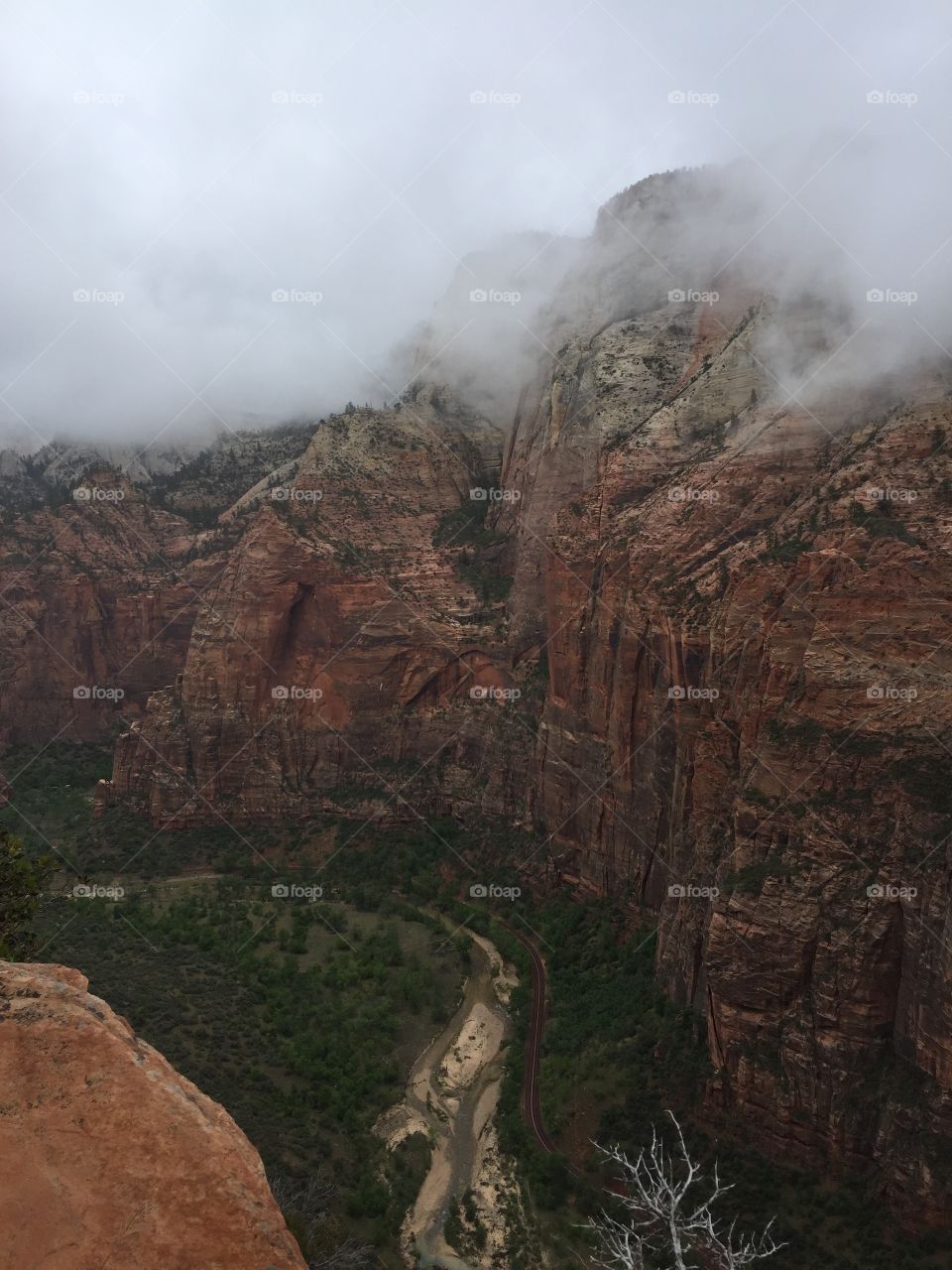 View of rocky monutain during fog