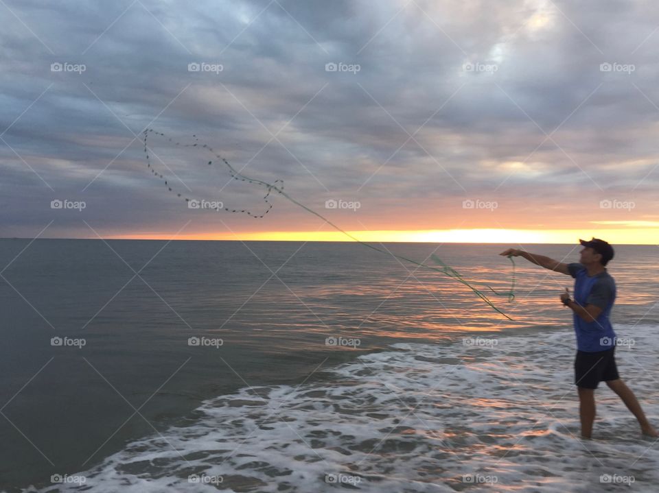 Casting a net at sunset | Bald Head Island, NC