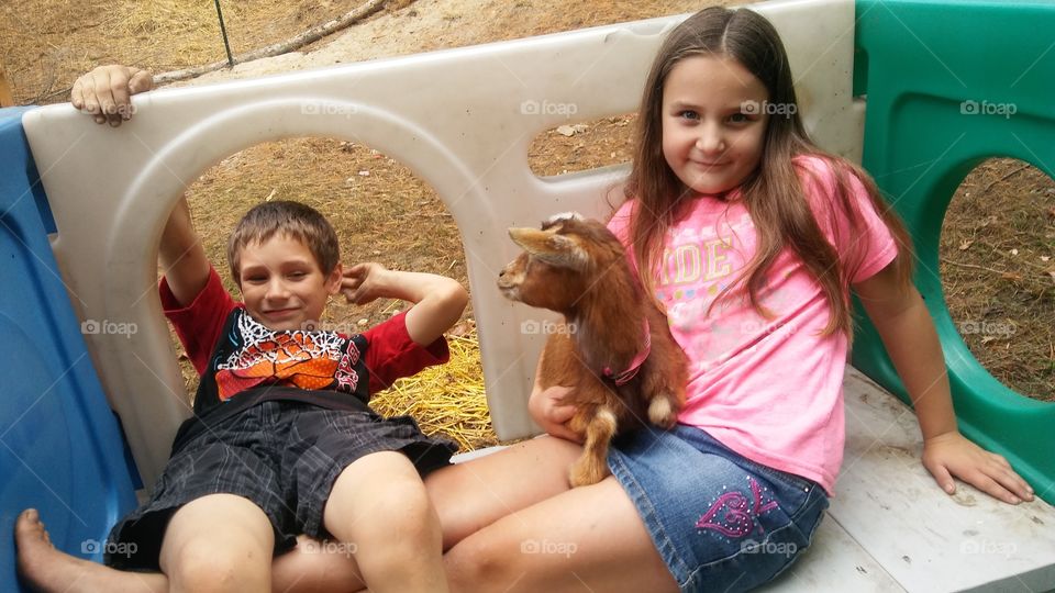 kids with a goat