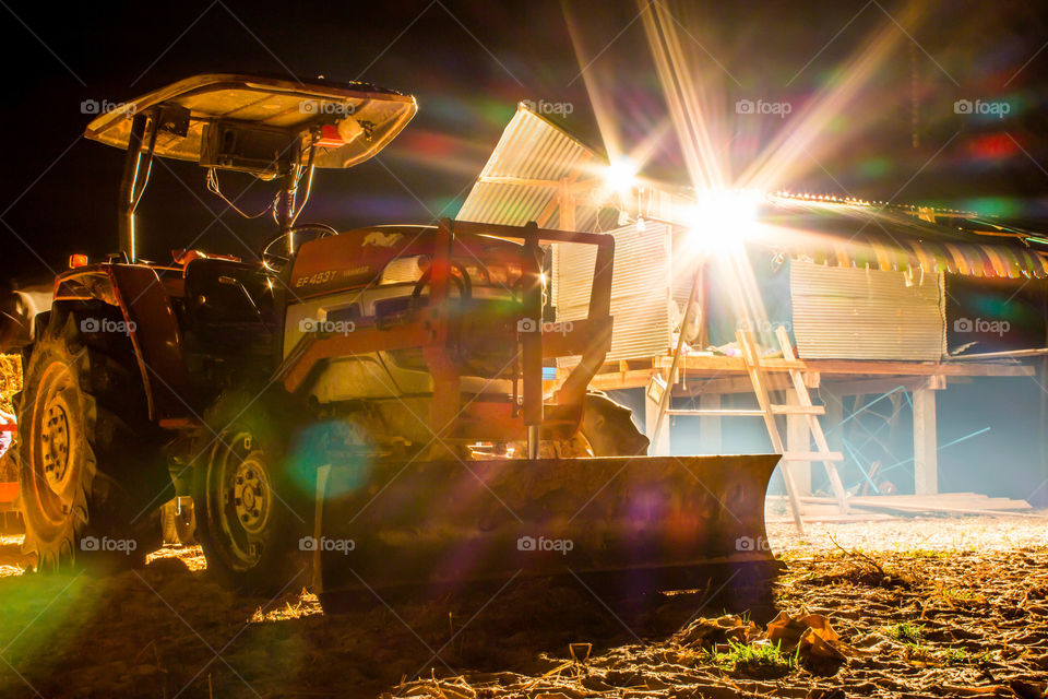 tractor in night time