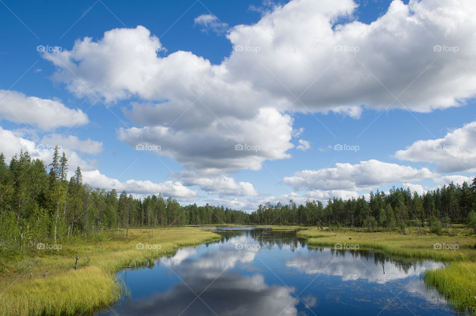 Reflection of sky and clouds in lake
